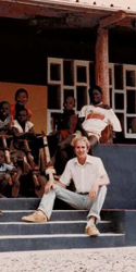 Eric Madeen with villagers on the steps of the primary school complex in Gabon